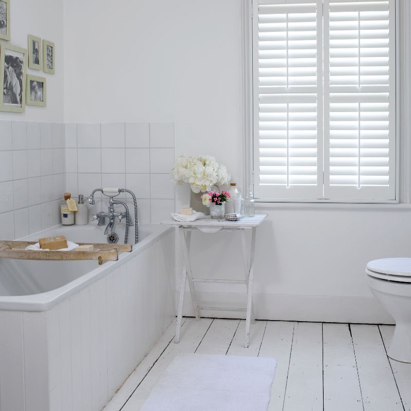 Faux-wood window shutters by Mastercraft Shutters who work in Sussex and Surrey